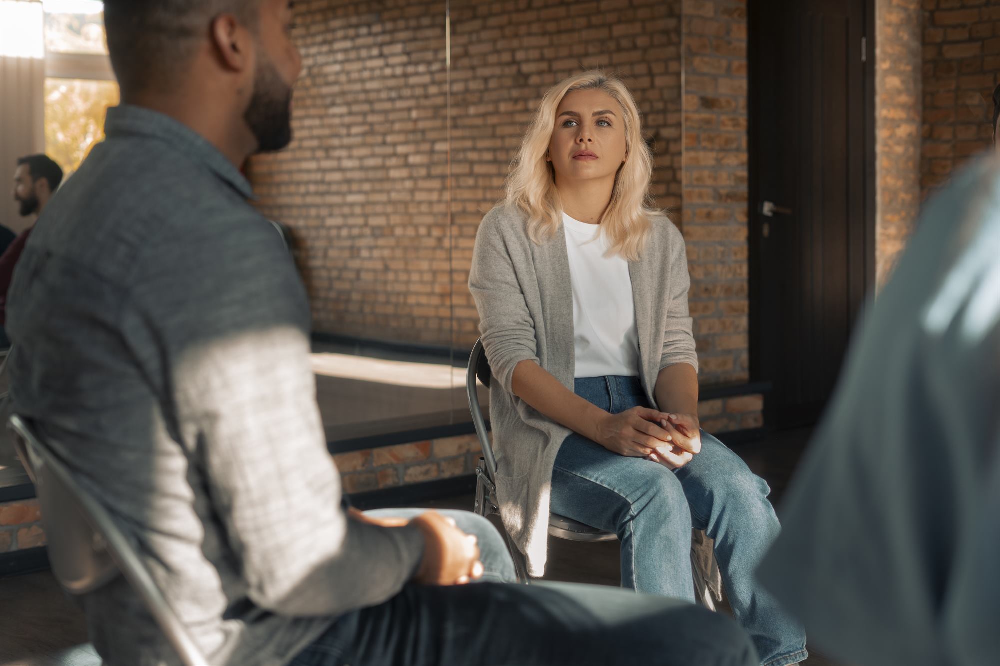 Therapist and client in a warm conversation